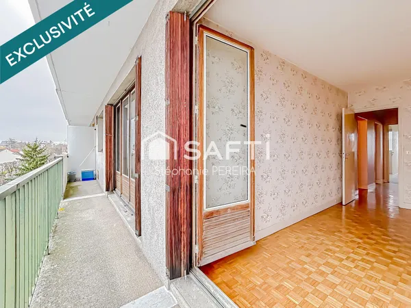Appartement spacieux à rénover avec cave et box 