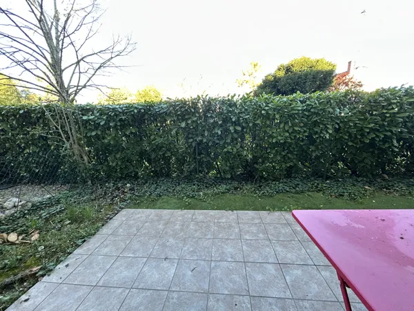 APPARTEMENT DE TYPE 3 DE 51.58 M2 AVEC JARDINET ET PLACE DE 