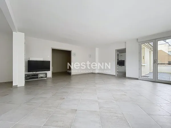 A vendre - Appartement Type 5 de 118 m² avec balcon, garage, stationnement et cave dans résidence 