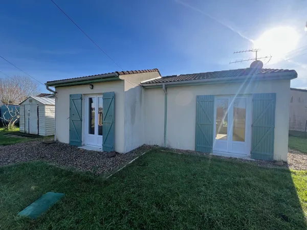 Maison de plain-pied avec 2 chambres et jardin 