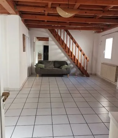 Maison de ville avec garage, cave et terrasse 