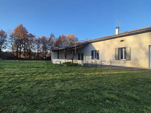 Maison en pierre 270m2 avec garage et jardin sur Layrac 