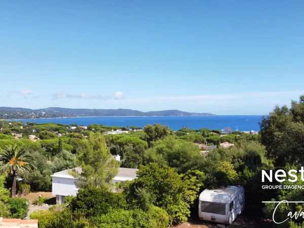 Terrain à fort potentiel avec maison des années 60 à rénover 