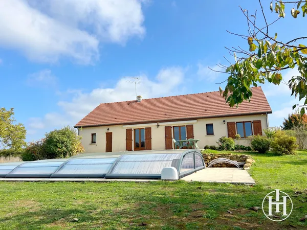 Pavillon de plain-pied avec piscine et terrain constructible 