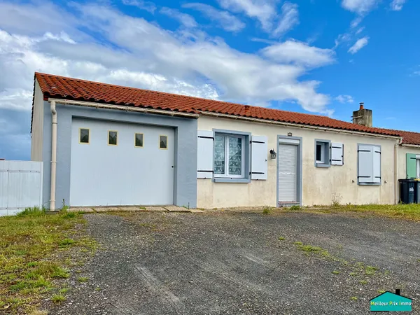 Maison de plain pied 3 chambres avec garage sur un terrain de 569m² 