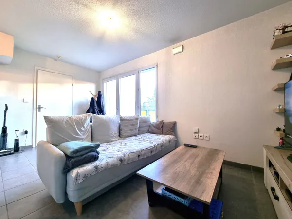 Appartement T2 avec terrasse et parking sous-sol 