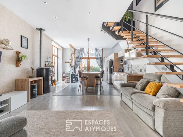 Appartement triplex de caractère au sein d'une copropriété historique 
