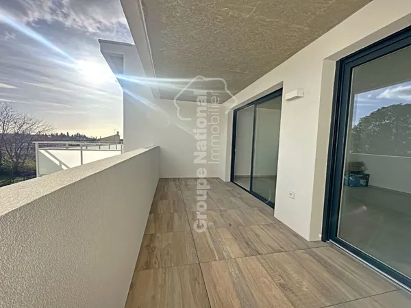Appartement Lunel 3 pièce(s) 61 m2 avec terrasse et Parking sécurisé 