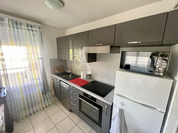 Appartement L'isle Jourdain 3 pièce(s) 61.35 m ² + 2 parkings 