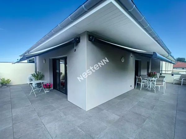 Superbe appartement de type 4 avec terrasse, stationnement et garage! 