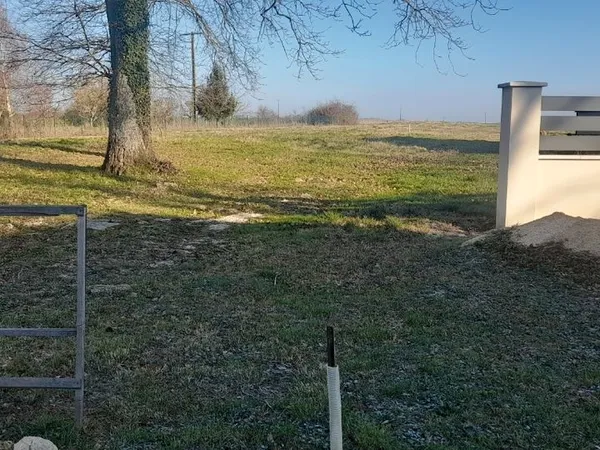 Terrain à bâtir + terre de culture 