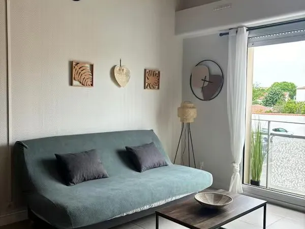 Appartement proche centre ville + place parking 