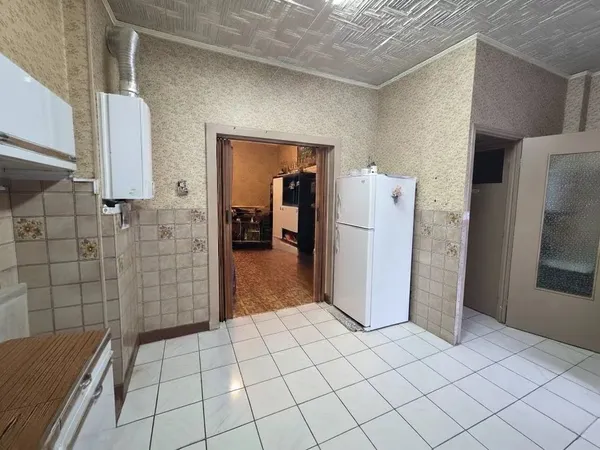 Maison à rénover 72m2 deux chambres terrasse et garage à Longwy bas. 