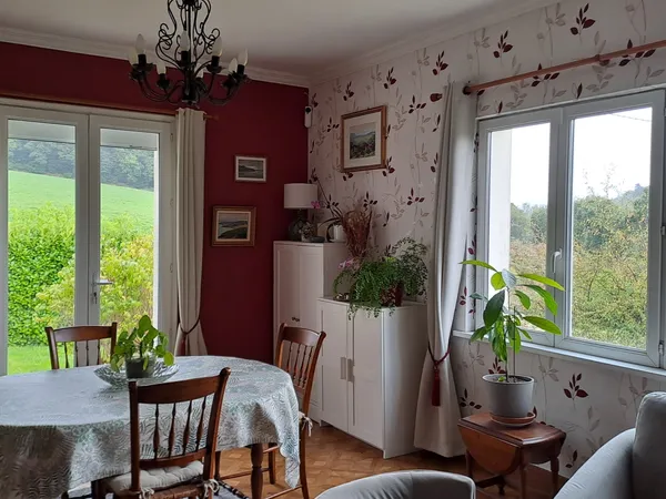 Propose chambre dans maison 