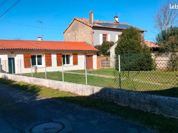 Maison avec garage et jardin 