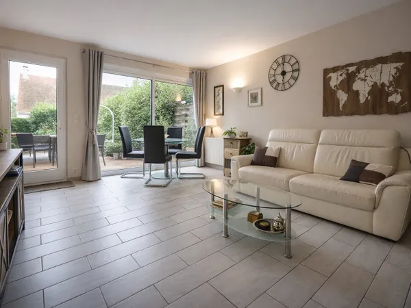 Charmant 2 pièces en rez-de-jardin au calme 