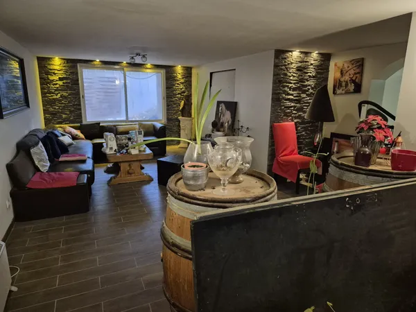 PROPRIETE A USAGE COMMERCIALE ET HABITATION 