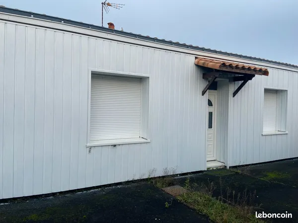À vendre maison mitoyenne a haut potentiel 
