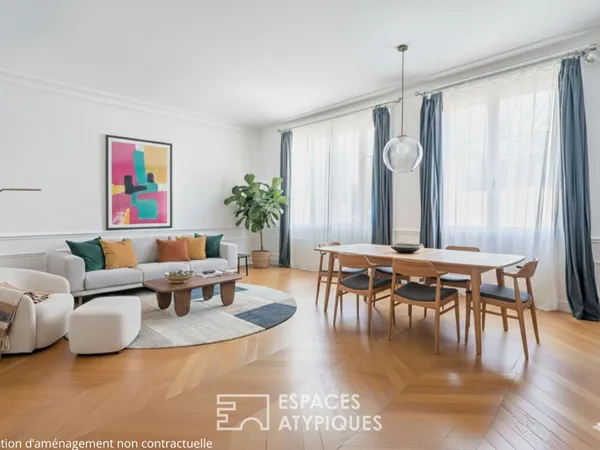Appartement bourgeois avec véranda face au parc des Buttes Chaumont