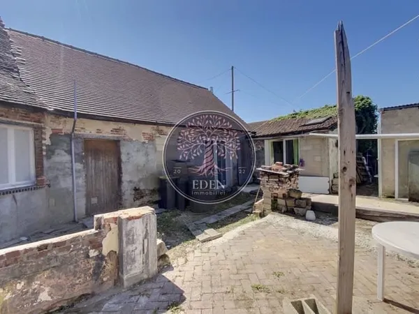 Maison dans village calme
