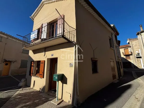 maison de village avec balcon et jardin