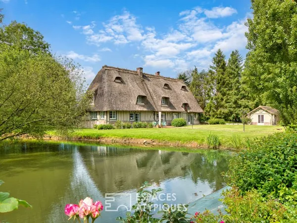 Propriété avec piscine à proximité dans le cadre bucolique du Marais Vernier