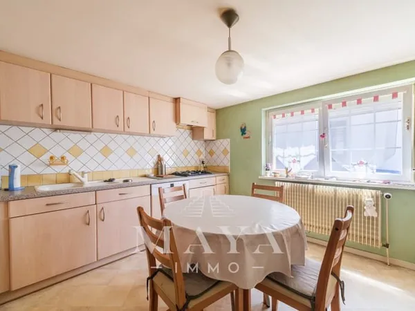 HENFLINGEN (ILLTAL), Maison de 138m2 avec une terrasse et un espace vert.