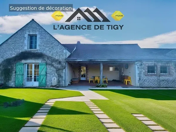 Maison familiale de 184 m2 habitable avec un étang .