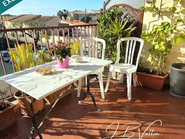 Grand appartement de type 4 traversant avec terrasse, cave et place de parking