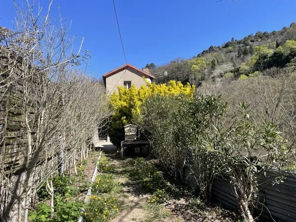 Maison de type 3 avec garage sur terrain d'environ 1340 m2 p