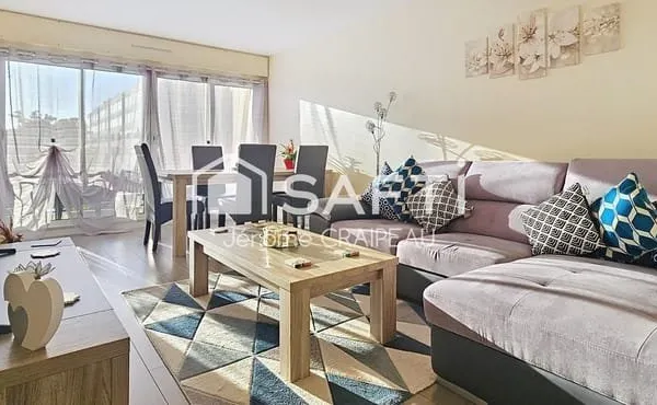 Centre ville : Appartement rénové avec 3 chambres + garage + cave + parking.
