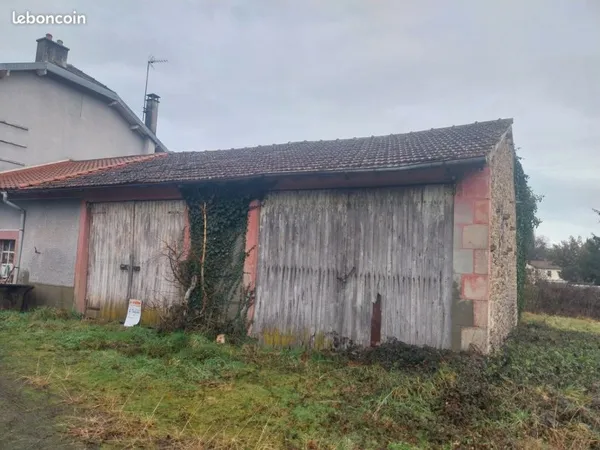 2 garages 90 M2 + terrain 500 M2