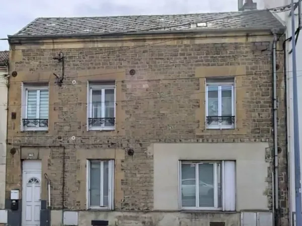 Appartement de 100 m2 en rdc avec 1 jardin proche du centre ville