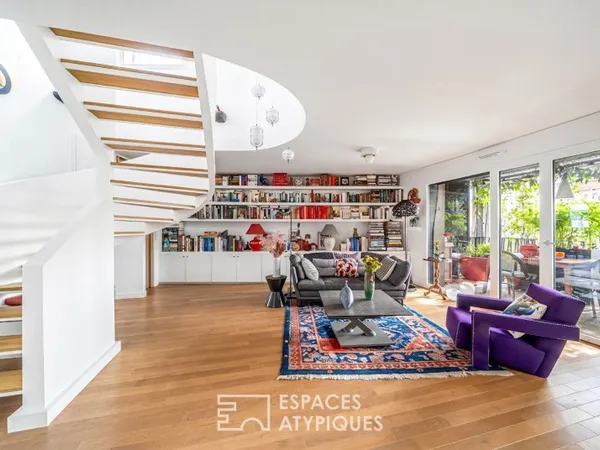 Duplex contemporain aux terrasses végétalisées, esprit canopée urbaine