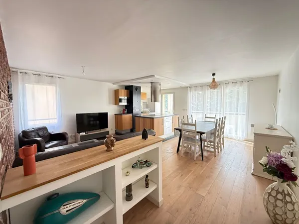 Appartement T3 avec terrasse, place de parking et garage