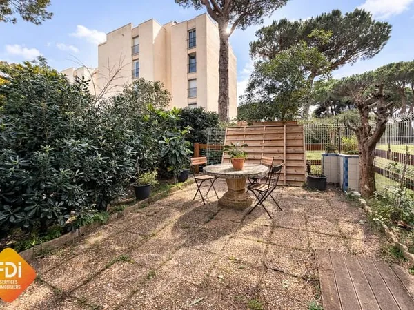 Ponant - studio en rez de jardin - parking