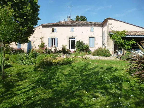 Maison pierre de 240m2, 4/5 chambres, dépendances, terrain de 2000m2