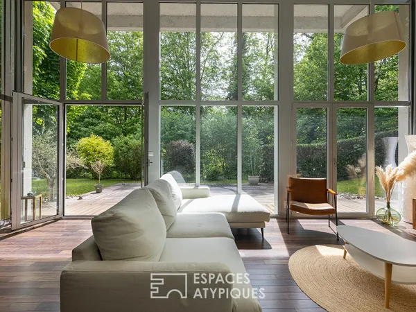 Duplex atypique et sa verrière sur la forêt