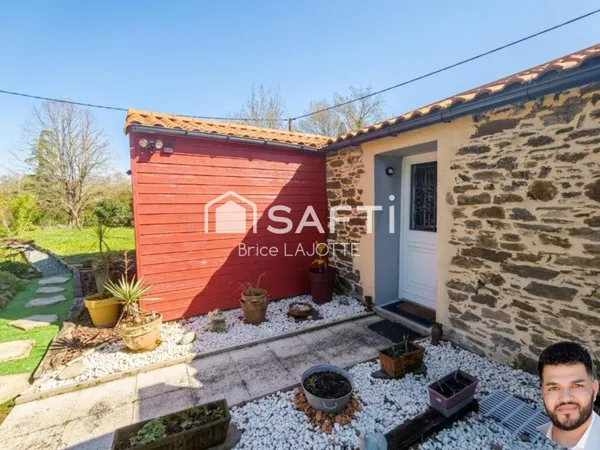 Maison de campagne calme, 2 chambres, dressing, véranda et jardin arboré.