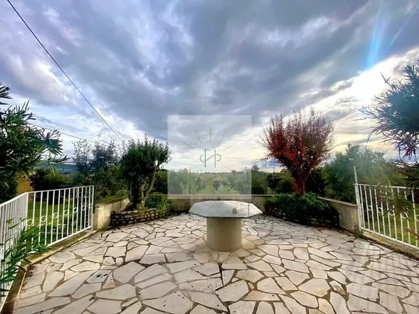 Maison avec grand terrain