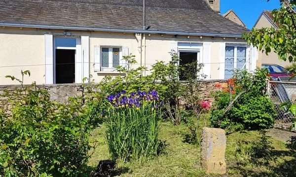 Maison de plain pied avec jardin et garage !