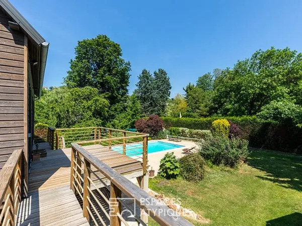 Maison sur île privée avec dépendance d'architecte, piscine et ponton privatif