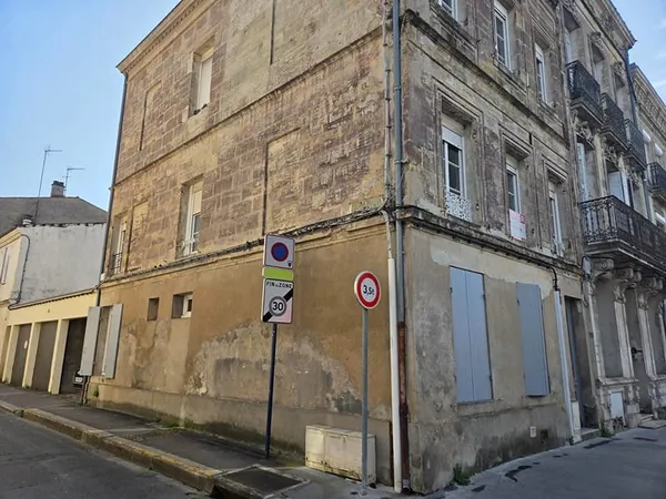 Immeuble de rapport 4 appartements et 3 garages