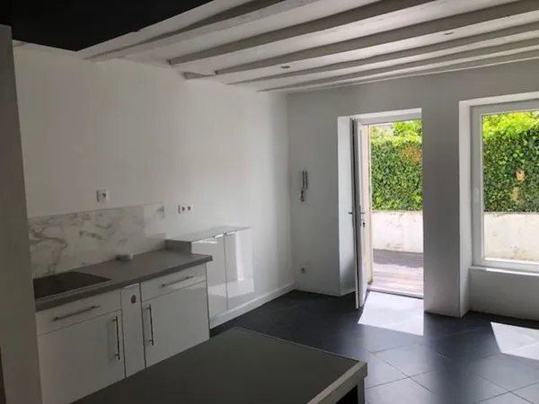 Maison avec jardin dans le quartier des Justices