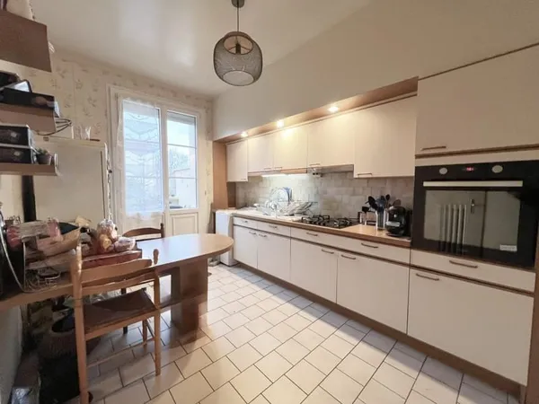 Appartement familial 4 chambres 102 m2 Garage, balcon et
