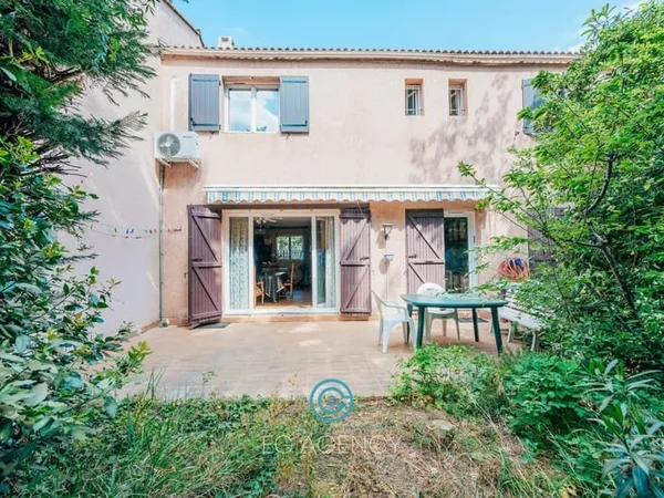 Maison mitoyenne de 101m2 avec garage, terrasse et jardin