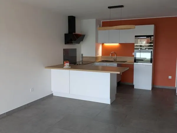 Appartement T3 de 69 m² au 1er étage avec ascenseur + Terrasse 27 m² + 2 garages