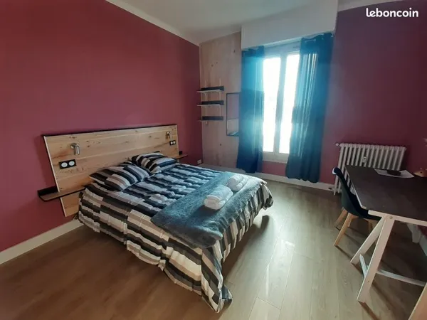 Grande chambre meublée en colocation