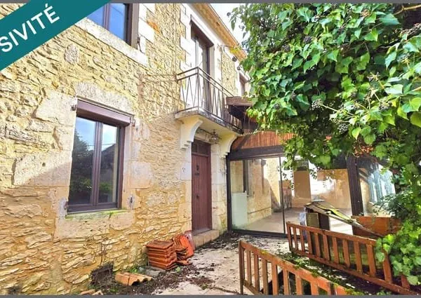 Maison de village en pierre 7 pièces 180 m² avec grand garage et jardin proche tous commerces et com