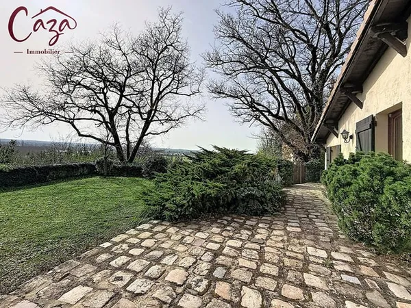 Maison en partie pierre Quinsac vue dégagée